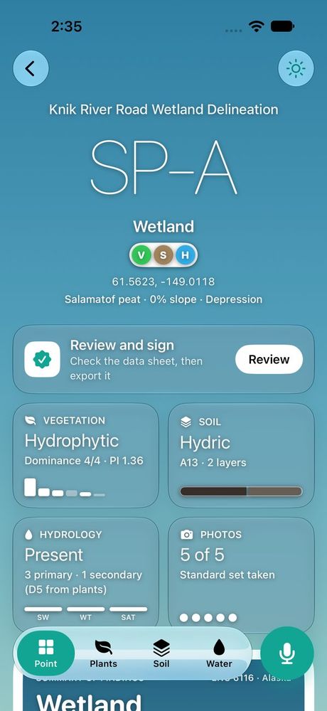 Point overview for sampling point SP-A on a blue sky: Wetland, with vegetation, soil and hydrology met and the next step “Review and sign”.